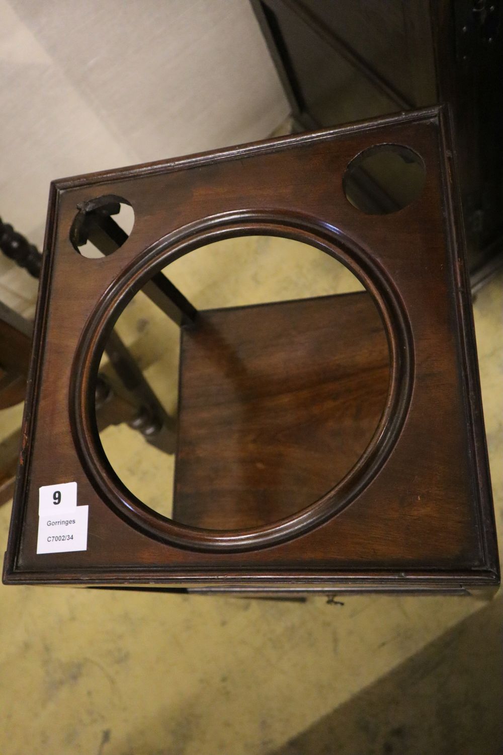 A George III mahogany washstand, width 34cm depth 34cm height 82cm